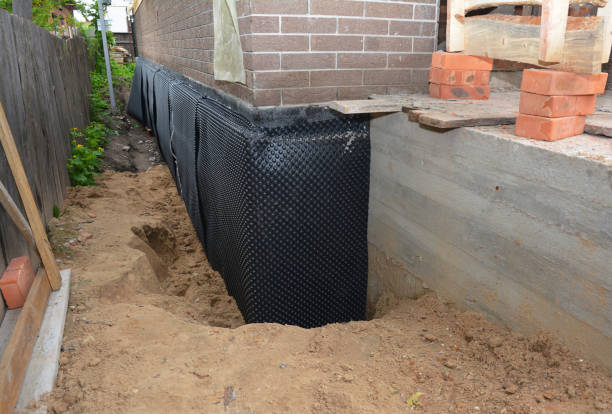 Happy homeowners after waterproofing job in Hamersville